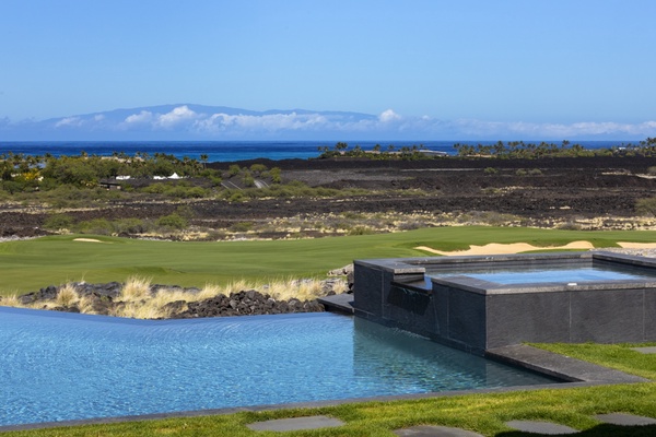 Infinity pool with an adjoining spa offers a luxurious and relaxation experience.