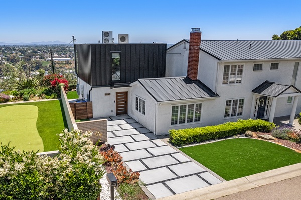 Private entry and yard with one wall connected to main house.