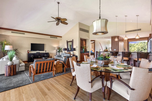 View from lanai into the great room featuring an elegant formal dining set for six.