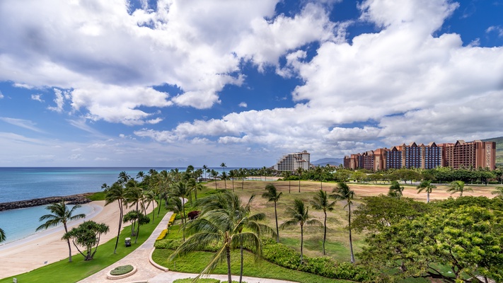 The beach and city skyline.