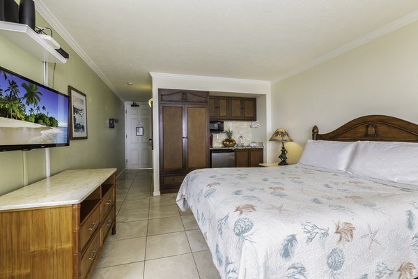 Bedroom with kitchenette for convenience.