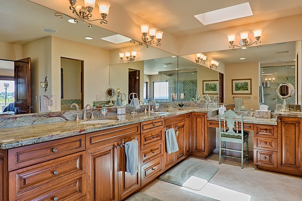 Primary bathroom features vanity seating