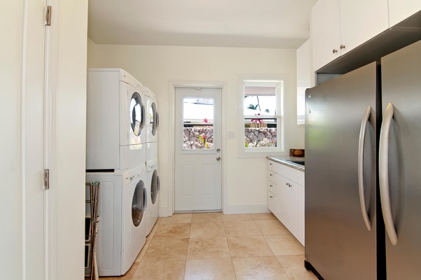 Laundry room - Two washers, two dryers, extra full fridge and full freezer