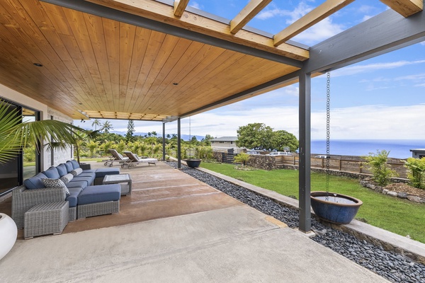 Front lanai with comfortable lounge chairs
