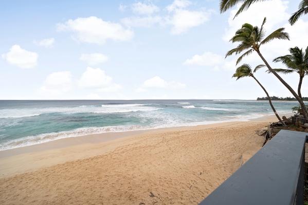 Expansive beach and ocean views from the upper level deck