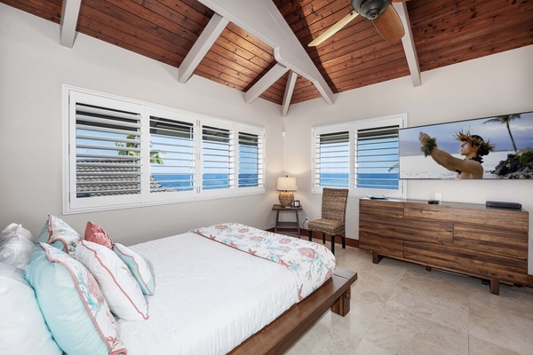 Guest bedroom with Queen bed, AC, TV, and Mountain views