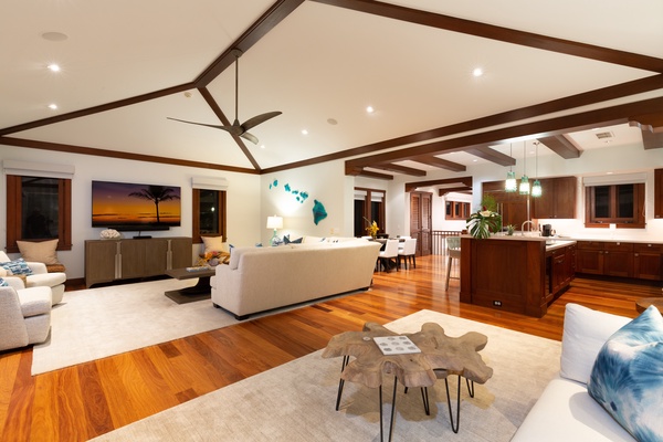 Alternate views of the striking great room, formal dining room and kitchen