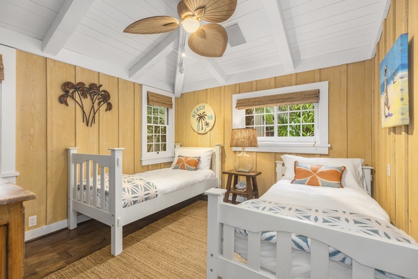 The fourth guest bedroom with two twin beds, a perfect sanctuary for the kids..