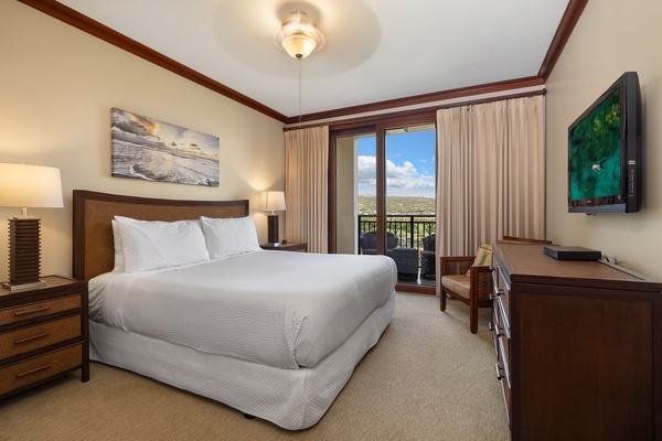 Welcome to your bright and cheery primary guest bedroom with lanai and a TV.