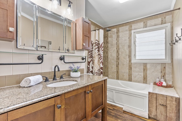 Guest bathroom with plenty of storage and counterspace