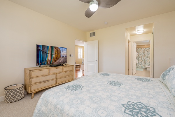 The primary suite comes with a dresser, TV and ensuite bathroom.