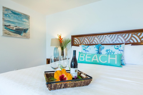 The downstairs primary bedroom with sliding doors that lead to the pool lanai.