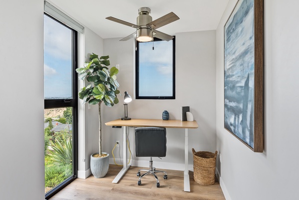 The upstairs office loft has plenty of outdoor views.