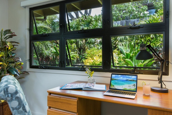 Office area in bonus living room, with beautiful garden views.