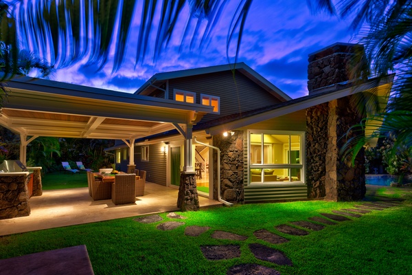 View from the corner of the yard, looking to the covered lanai and living room: magical nights guaranteed!