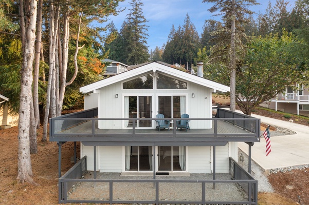 Expansive wrap-around balcony adds charm to this cozy home