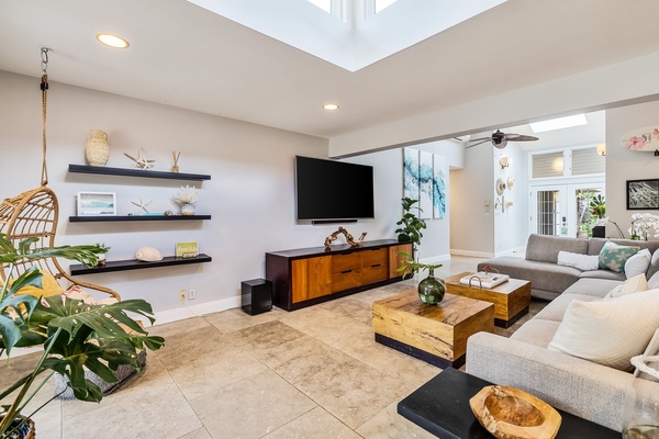 The living area is drenched in natural light