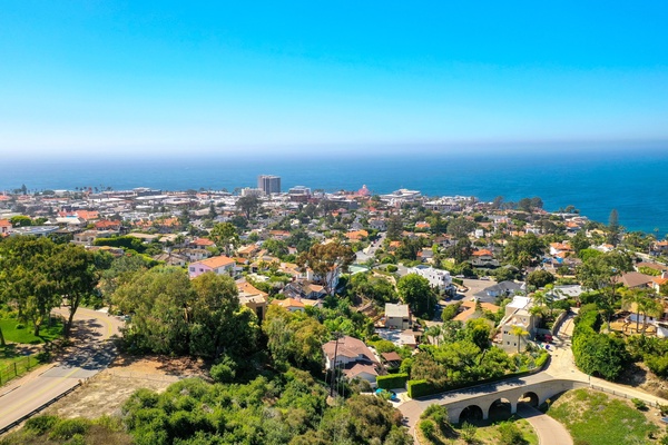 Positioned majestically below the illustrious La Jolla Country Club and nestled in the embrace of a picturesque canyon.