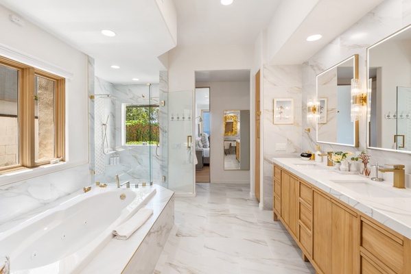 Bathroom with a walk-in shower and dual sink