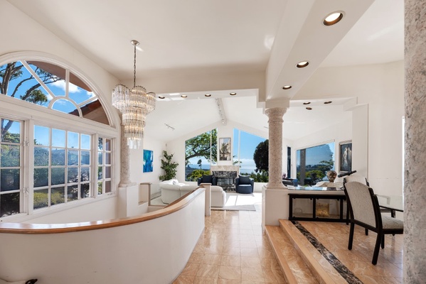 View of the formal living room and raised dining area