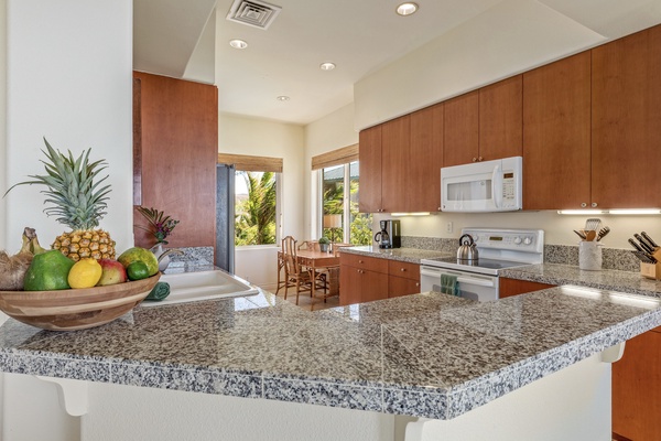 Gleaming granite countertops and modern appliances - a chef’s delight!