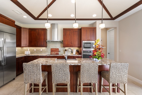 Kitchen big island with stools for quick meals or entertainment.