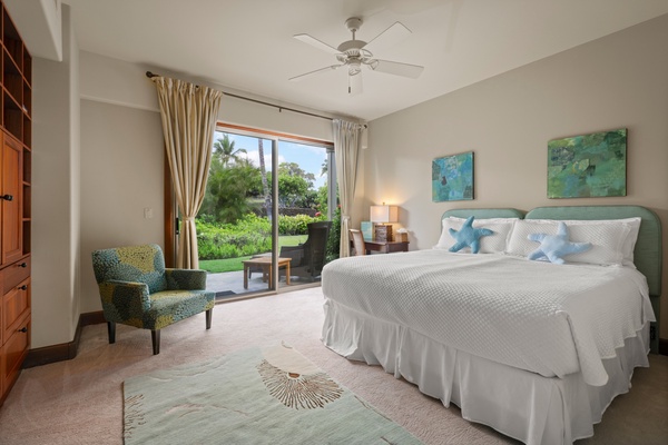 The lower level guest bedroom features two twin beds that can be converted into a king bed, offering flexible sleeping arrangements.