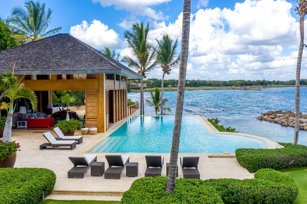 ive into the infinity pool overlooking the ocean, for a perfect day in paradise in Dominican Republic.