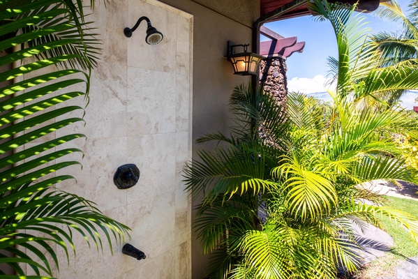 An outdoor shower is available right off the primary bath.