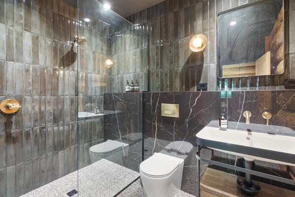 Ensuite bathroom has a walk-in shower.