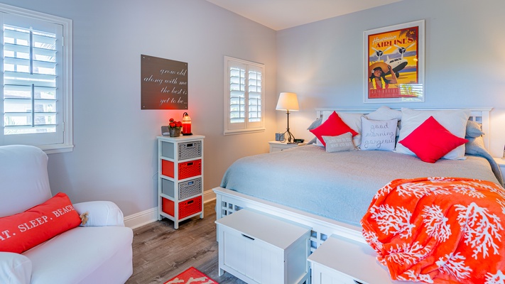 The primary guest bedroom features whimsical artistry and extra storage.