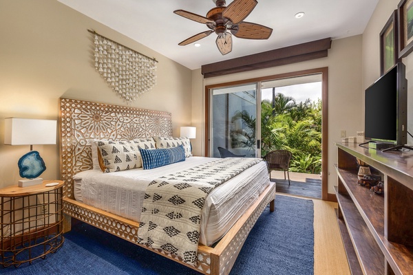 Downstairs guest room with king bed, private deck, flat screen TV and adjacent full bath.