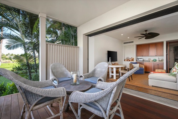 Seamless indoor-outdoor living in the family den with a sliding glass pocket door that leads to the lanai.