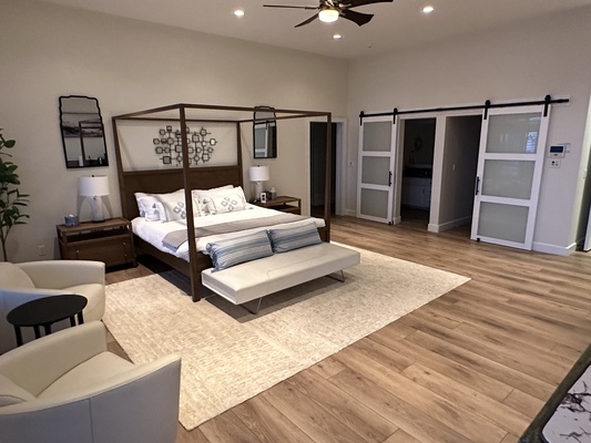 Spacious bedroom with walk-in closets to stay organized during your stay.