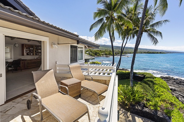 Facing back into the primary bedroom from the Private Lanai showcasing the Kona shoreline