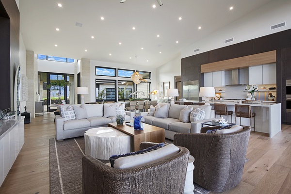 Kitchen and dining spaces behind the living area.