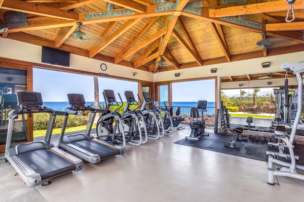 Fitness room interior with multiple and varied cardio and weight machines.