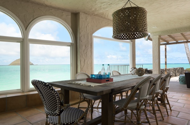 Take in the spectacular view with seating for eight at the dining table.