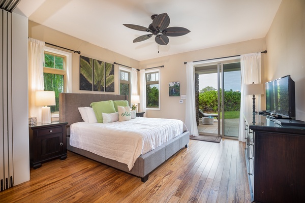 A second downstairs bedroom with two queen beds shares a full bath with the third bedroom