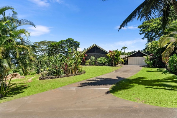 The driveway with beautiful landscape.