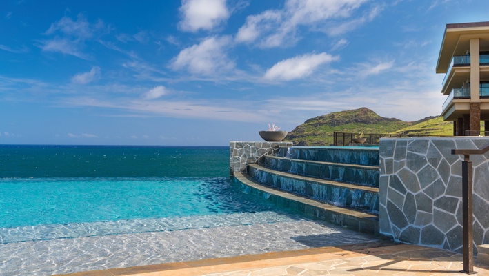 The infinity-edge Kaiholo pool seems to flow right into the ocean.