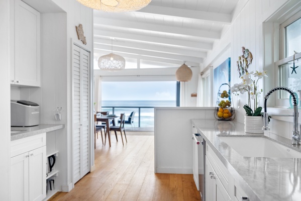 The kitchen opens directly into the dining space