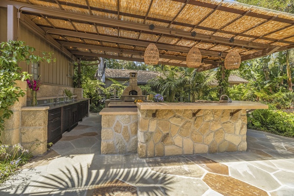 The fully-equipped outdoor kitchen is a chef's delight.