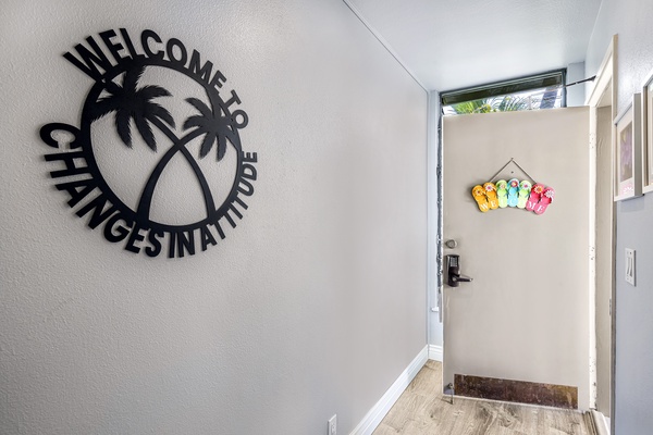 Entry and foyer of 9-303 featuring a keyless entry lock