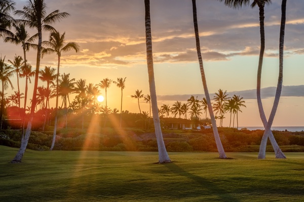 Golf course view from your lanai at sunset.