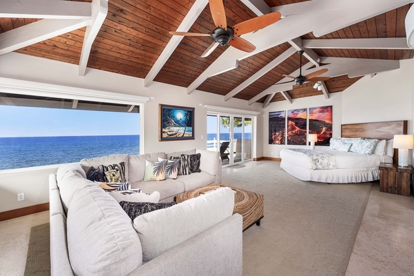 Primary bedroom with King bed, AC, TV, lounge area and ocean views