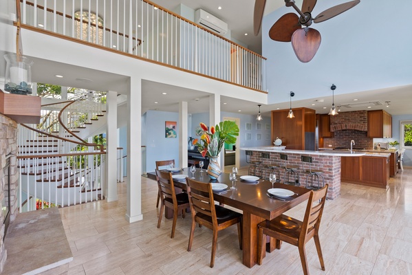Dining and kitchen area, with three-story ceilings
