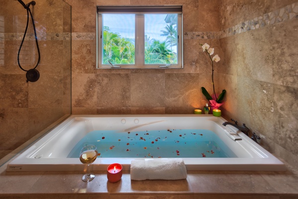 Sit back and relax in the primary bathroom tub