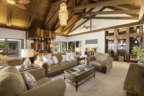 Living Room features vaulted ceilings, a/c and custom bar