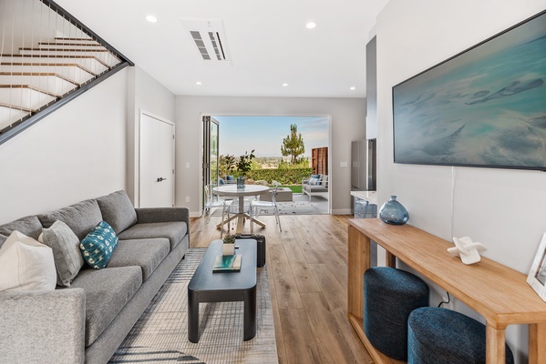 Entry living area with California indoor - outdoor living.